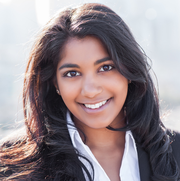 Asian Indian businesswoman A shot of a smiling confident Asian Indian businesswoman outdoor